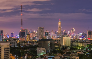 The image looks down at Bangkok, Thailand, at night and morning.