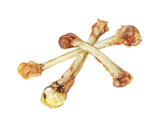 Three crossed picked chicken bones isolated on white.Poverty concept.