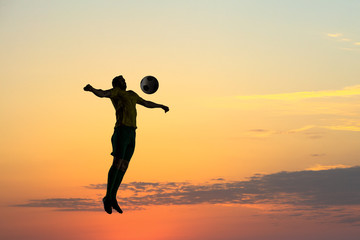 Fototapeta premium Soccer player with ball outdoors