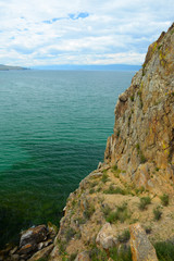Fototapeta na wymiar Wonderful view of lake Baikal, Shaman Rock, Olkhon, Russia