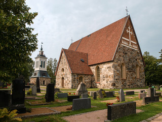 Fototapeta na wymiar Old calm quiet church graveyard - Church in Scandinavian style