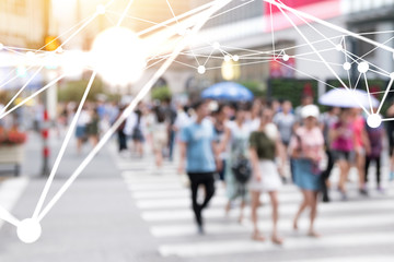 Internet of things , iot , smart city , big data technology concept. Neural networks connect atoms and blur city people cross street background. Flare light effect , 3d Rendering.