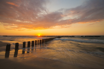 Fototapeta na wymiar Sunset over the sea beach, Baltic Sea, Poland