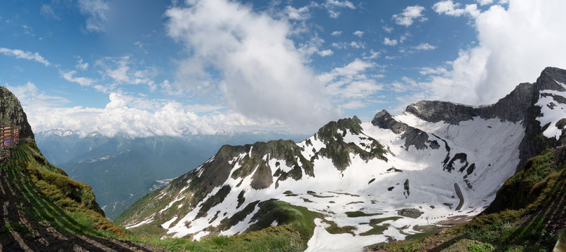Mountain peaks of the Alps in the snow at summer