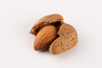 Whole almonds nuts isolated on white background