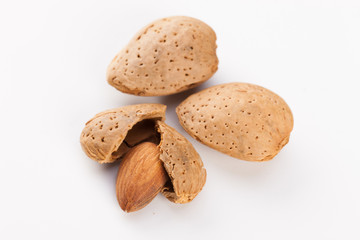 Whole almonds nuts isolated on white background