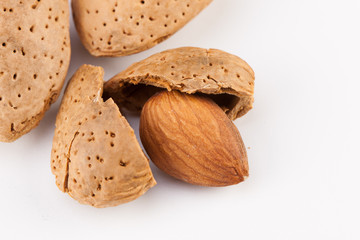 Whole almonds nuts isolated on white background