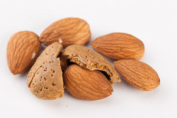 Whole almonds nuts isolated on white background