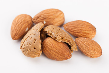 Whole almonds nuts isolated on white background