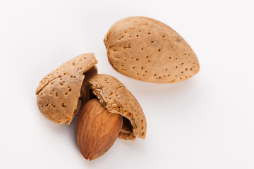 Whole almonds nuts isolated on white background