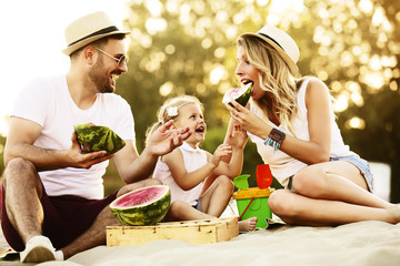 Eating watermelon on the beach