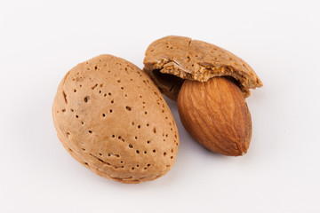 Whole almonds nuts isolated on white background