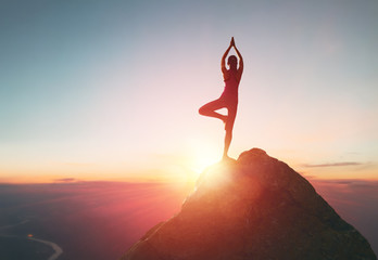 Woman practices yoga