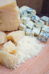 Grated Parmesan and sliced Blue cheese