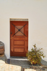 traditional portuguese door on white wall in monsaraz