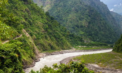 Green valley in Himalaya mountains along Manaslu circuit track in Nepal