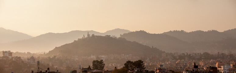Panoramic view to Kathmandu city and Swayambhunath temple at the hill, Nepal