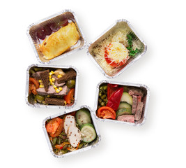 Healthy food take away in boxes, top view isolated at white
