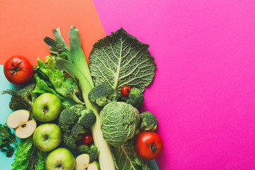Flat lay of raw vegetables on abstract background
