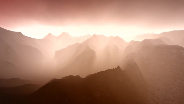Flying over mountains in the fog