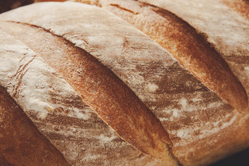Bread texture background, closeup of baguette loaf