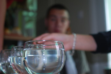 Girl playing glass harp 