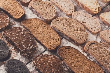 Bakery concept. Plenty of sliced bread background