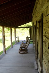 The rockers on the front porch of the cabin.