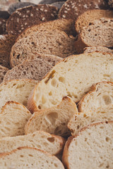 Bakery concept. Plenty of sliced bread background