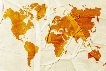 Brown world map on sepia crumpled paper. Elements of this image furnished by NASA.