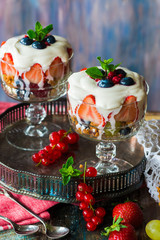 Obraz na płótnie Canvas Strawberry fruit salad with honey yoghurt
