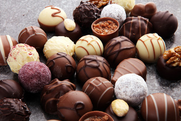 a lot of variety chocolate pralines, belgian confectionery gourmet chocolate