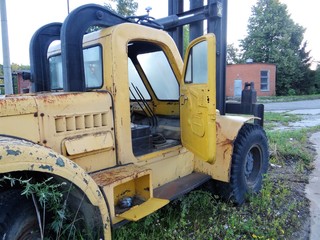 Abandoned truck with the door open.