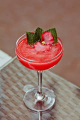 Beautiful fresh cool summer fruit smoothie with strawberries and mint