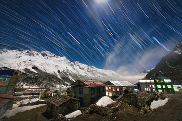Star tracks over the village of Kyangzhin Gompa in the Langtang Valley