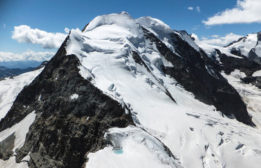 Fototapeta na wymiar high alpine peak of Piz Palü near St. Moritz in the Swiss Alps un summer