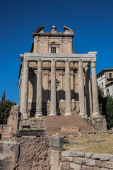 Fototapeta na wymiar One of the most famous landmarks in the world - Roman Forum :Temple of Antoninus and Faustina, 141 AD. Rome, Italy.