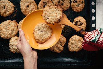 Woman baking homemade cookies to holiday