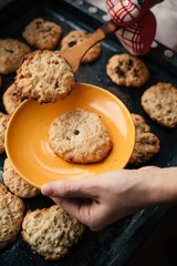 Woman baking homemade cookies to holiday
