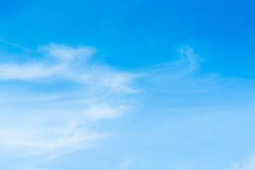 Blue sky with clouds background lines intersect.