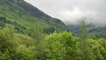 Low hanging clouds on the mountains at Glencoe, Scotland, United Kingdom