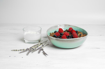 Healthy oat and almond flour berry crumble with soja yogurt