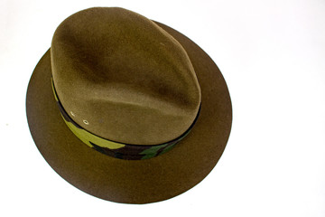 Close-up of a mans hat on white