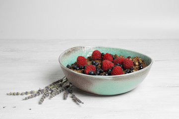 Healthy oat and almond flour berry crumble with soja yogurt