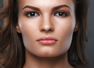 Obraz premium Close up portrait of beautiful woman face