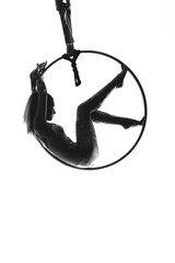 girl on the air ring gymnastics silhouette isolated on the white background