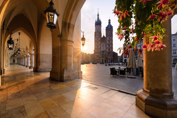 Fototapeta Old city center with St. Mary's Basilica in Krakow in sun lights. obraz