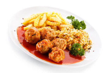 Meatballs with french fries and vegetables