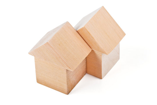Toy houses made of wooden blocks