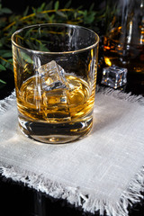 whiskey with ice in glass